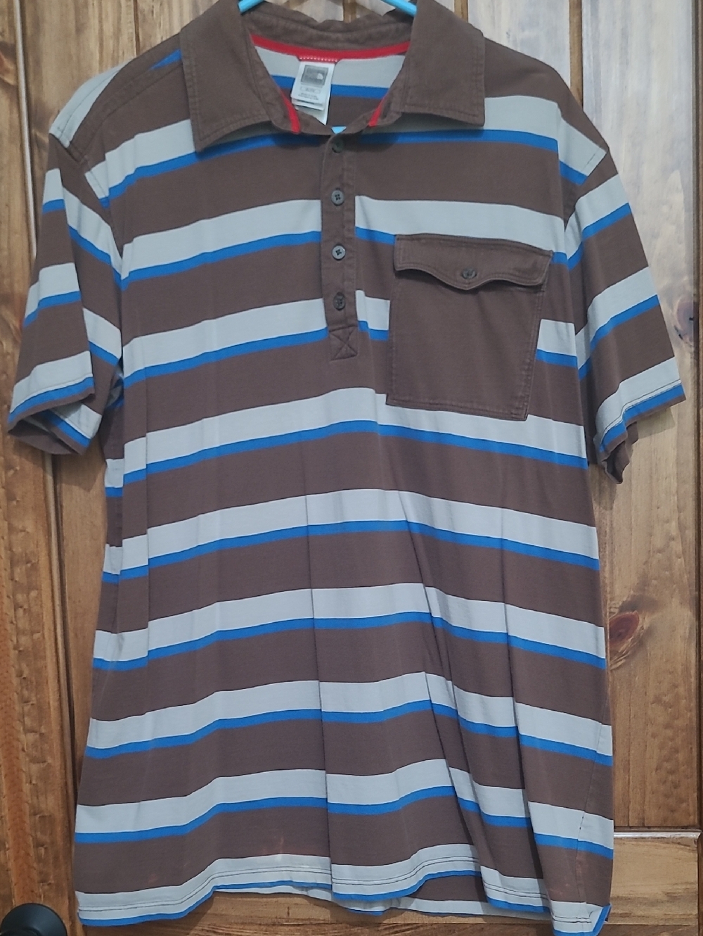 The North Face Brown Polo with Blue and Light Gray Stripes. Size XL